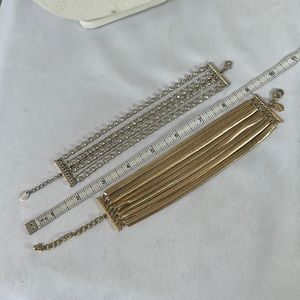 Two chain style bracelets silvertone goldtone
